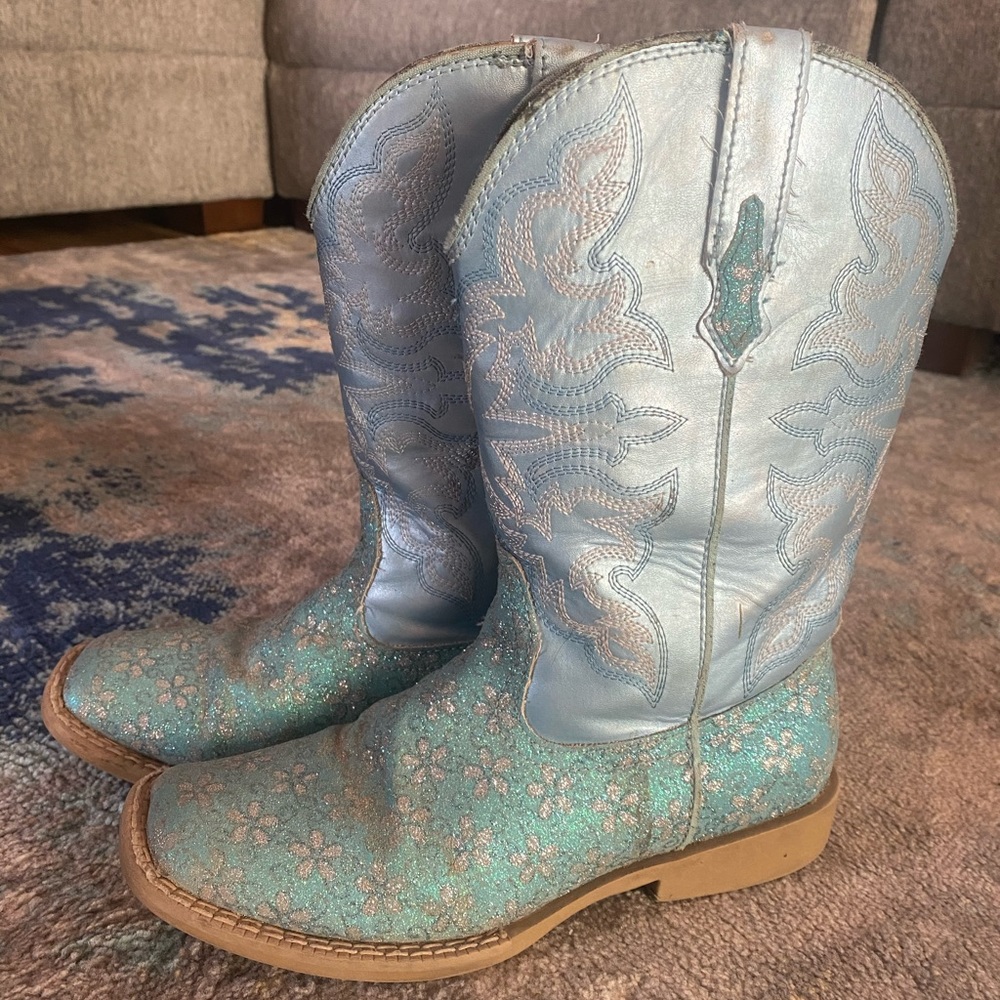 Blue sparkly cowboy boots.